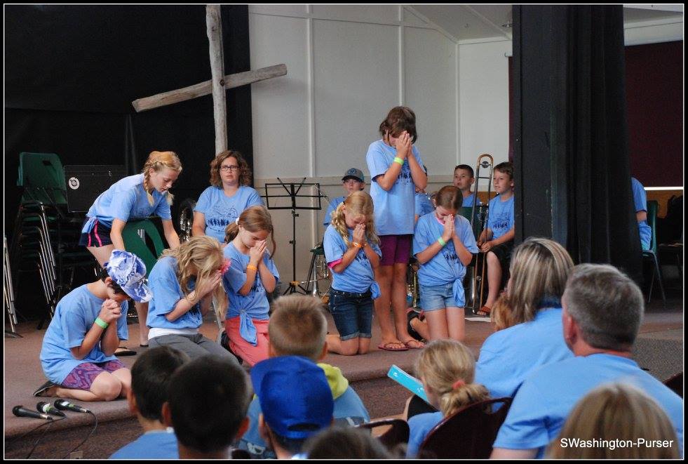 Campers performing a drama skit as part of the final Junior Music Camp Concert